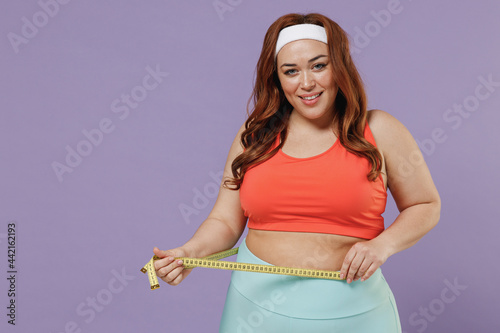 Εκτύπωση καμβά Young smiling fun happy chubby overweight plus size big fat fit woman 20s wearin