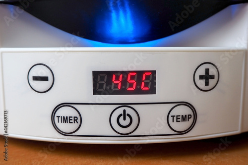 digital display of the white fruit and vegetable dryer showing the temperature of 45 degrees
