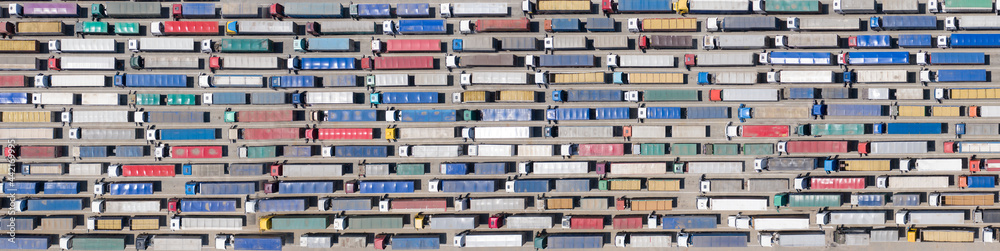 Trucks stand in line to the terminal. Trucks stand in line to the terminal.