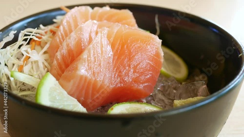 Wallpaper Mural Portioned raw salmon fillets in ice with lemon. Torontodigital.ca