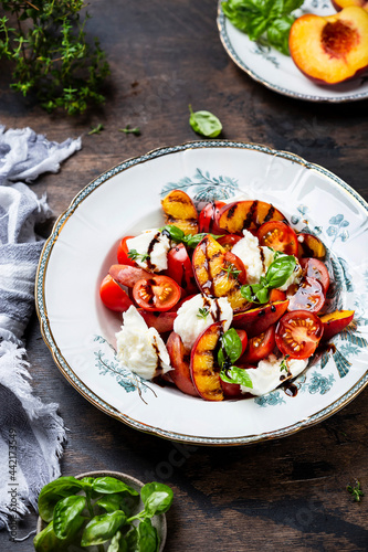 Grilled peach salad with mozzarella and tomatoes
