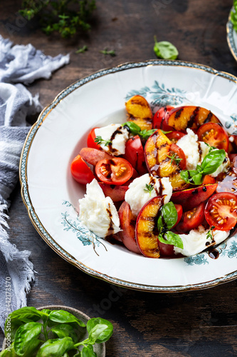 Grilled peach salad with mozzarella and tomatoes