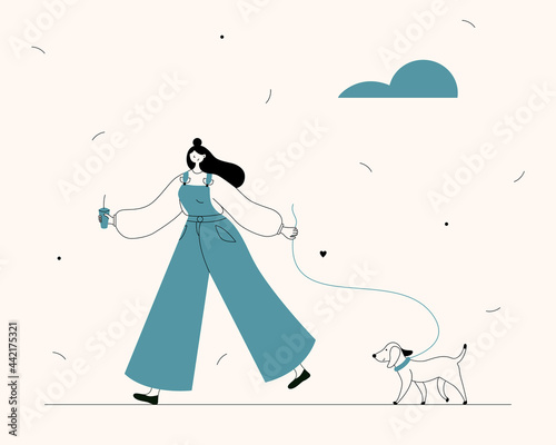 Young woman Walking with Dog outside.