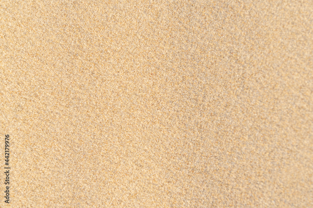 Sand texture on the beach. Brown beach sand for background. Sand texture on the beach. Brown beach sand for background.