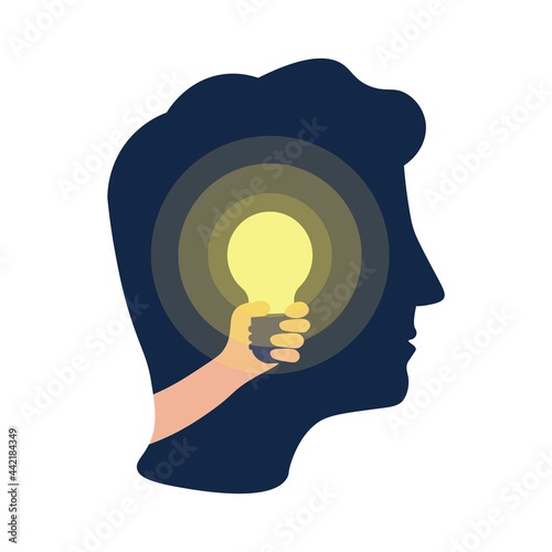 light bulb in human hand