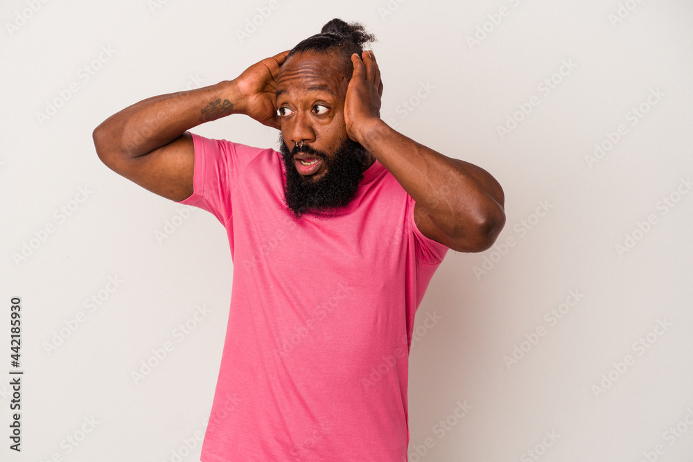 African american man with beard isolated on pink background screaming, very excited, passionate, satisfied with something. African american man with beard isolated on pink background screaming, very excited, passionate, satisfied with something.