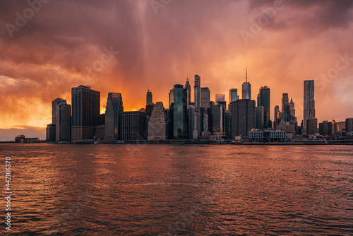 Skyline of Manhattan and the East River at sunset  Dumbo  Brooklyn  New York City