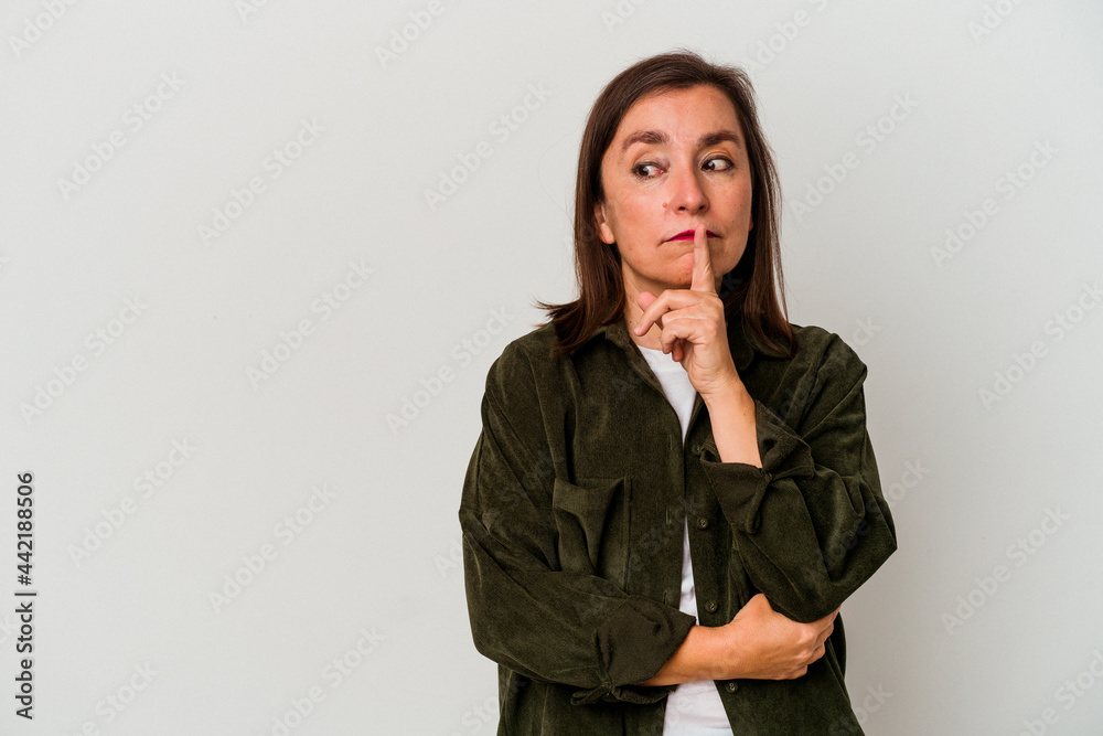 Middle age caucasian woman isolated on white background looking sideways with doubtful and skeptical expression. Middle age caucasian woman isolated on white background looking sideways with doubtful and skeptical expression.