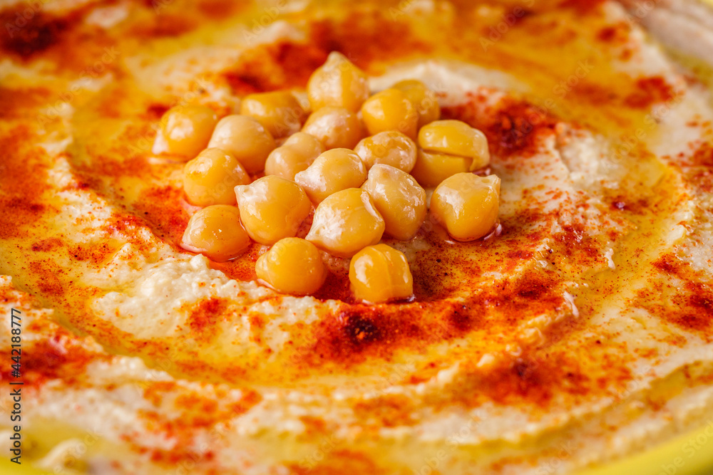 traditional turkish hummus on a white wooden rustic background traditional turkish hummus on a white wooden rustic background