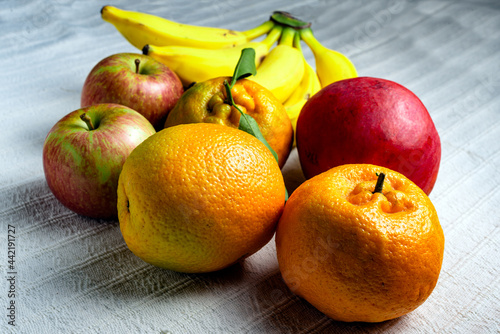 Tropical fruit mix on a table with white tablecloth
