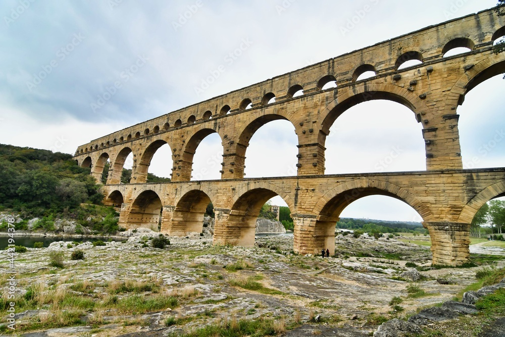 pont du aqueduct in france, photo as a background , in Pont du gard, gardon, nimes france - obrazy, fototapety, plakaty 