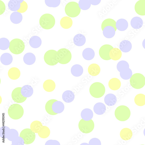 Multicolored circles on a light background. Seamless endless pattern a pattern of whole and cropped circles in yellow, pink, green on a green background