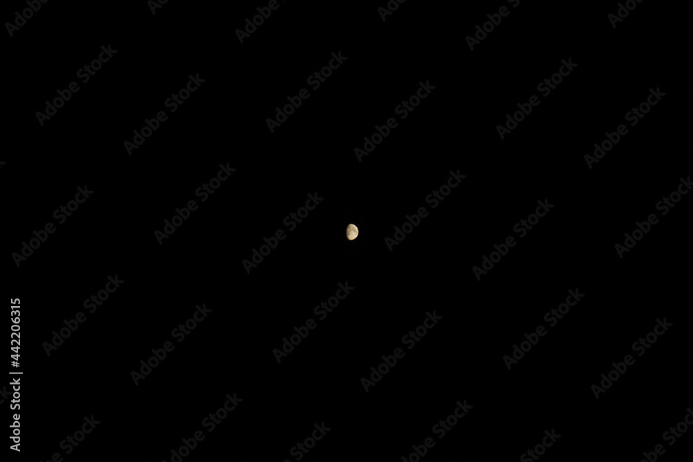 the moon that looks far away in the dark night the moon that looks far away in the dark night