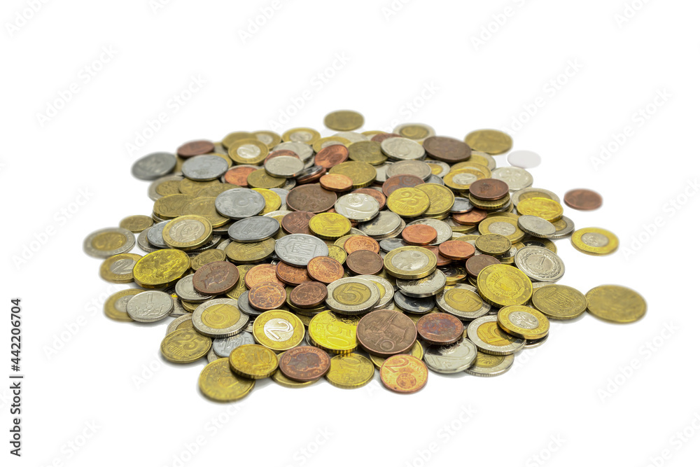 Coins of different countries and different denominations on a white background Coins of different countries and different denominations on a white background