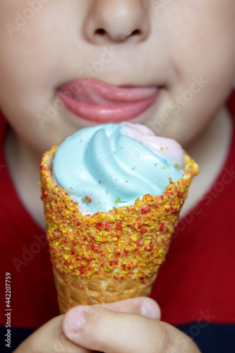 little child eating ice cream  ice cream tasty  boy eating ice cream  ice cream cones  ice cream in hand