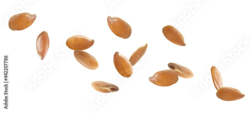 Many linseeds falling on white background, banner design. Vegan diet