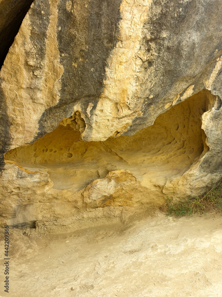 Ancient rock carvings petroglyphs of people with boat in Gobustan National park. Exposition of Petroglyphs in Gobustan near Baku, Azerbaijan. Ancient rock carvings petroglyphs of people with boat in Gobustan National park. Exposition of Petroglyphs in Gobustan near Baku, Azerbaijan.