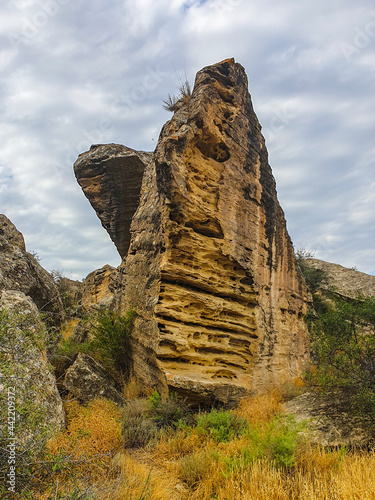 Gobustan national park ancient rocks, rock path and mountains near Baku in Azerbaijan. Exposition of Petroglyphs in Gobustan near Baku, Azerbaijan.
