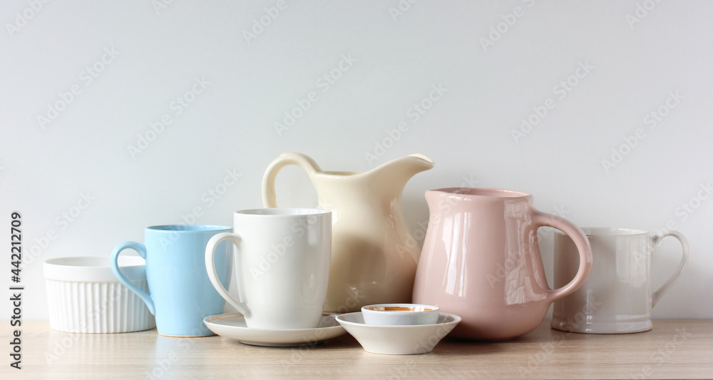 jugs and mugs on the table. jugs and mugs on the table.