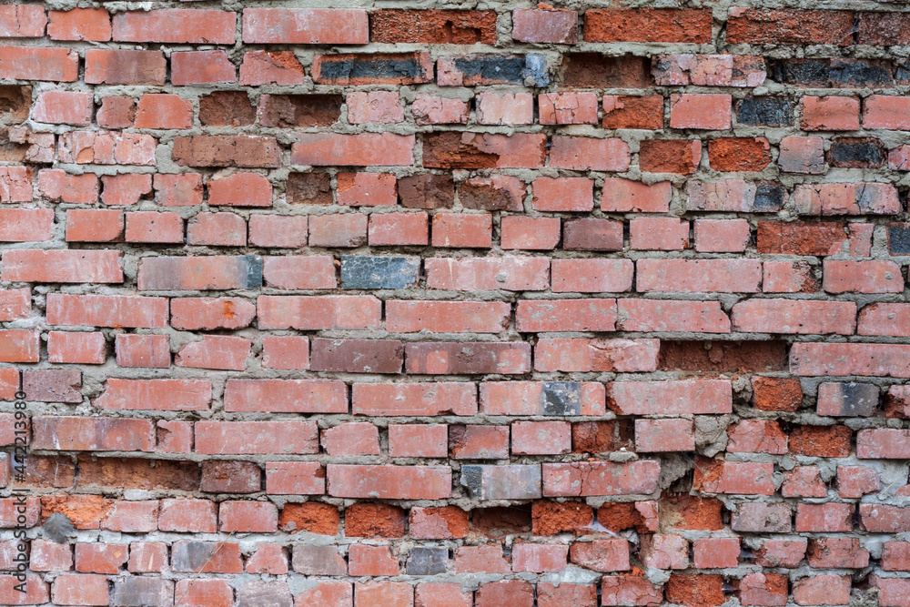 Naklejka premium The old ruined walls of red brick