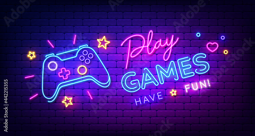 Fotografie, Obraz Play Games have fun neon sign with game pad, bright signboard, light banner