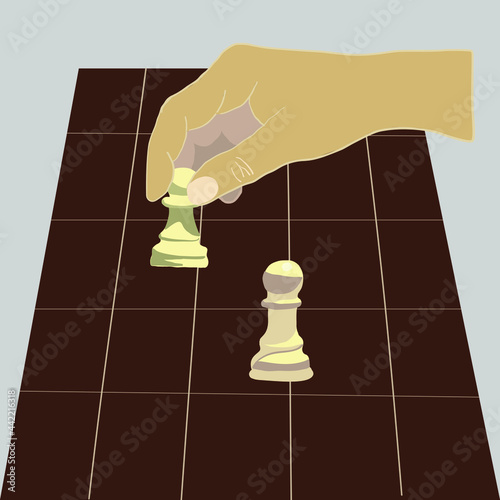 Human hand holding chess pawn. Human move pawn chess piece on the chessboard. Business strategy success concept.