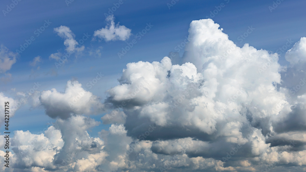 Beautiful blue sky with white clouds as a natural background. Beautiful blue sky with white clouds as a natural background.