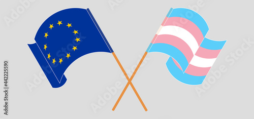 Crossed and waving flags of the EU and transgender pride