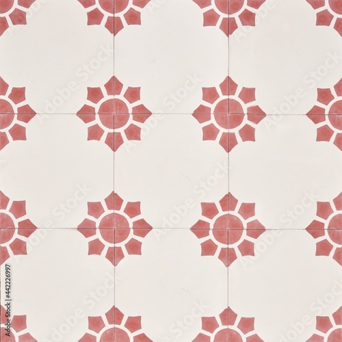 Spanish cement tile texture with sunburst design