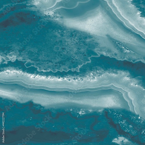 Teal wall and floor tile texture with marbled effect
