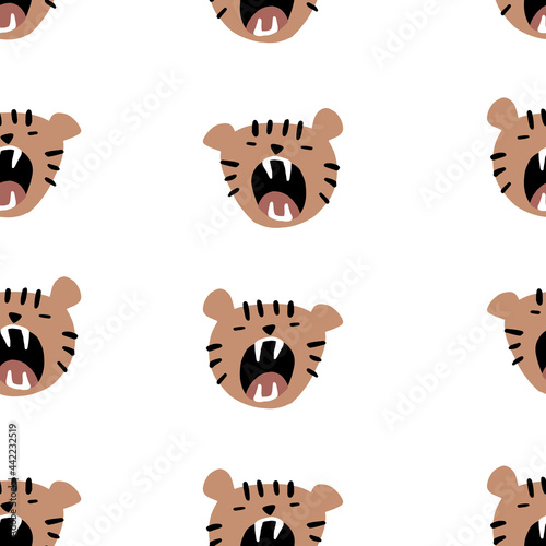 Seamless baby pattern with the head of a tiger cub that growls or yawns. Children's illustration for books, wallpapers, clothes