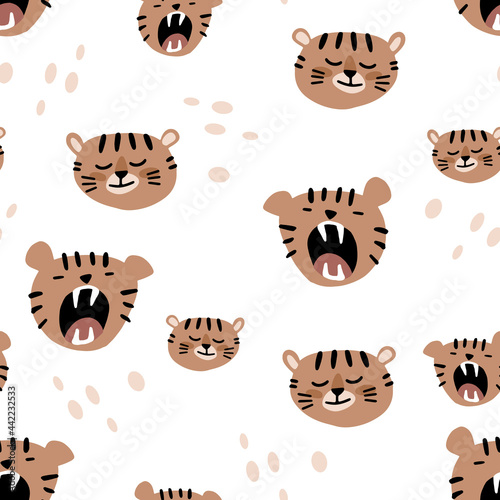 Cute baby seamless pattern with lion heads. Bright illustration for printing on wallpapers, fabrics, covers