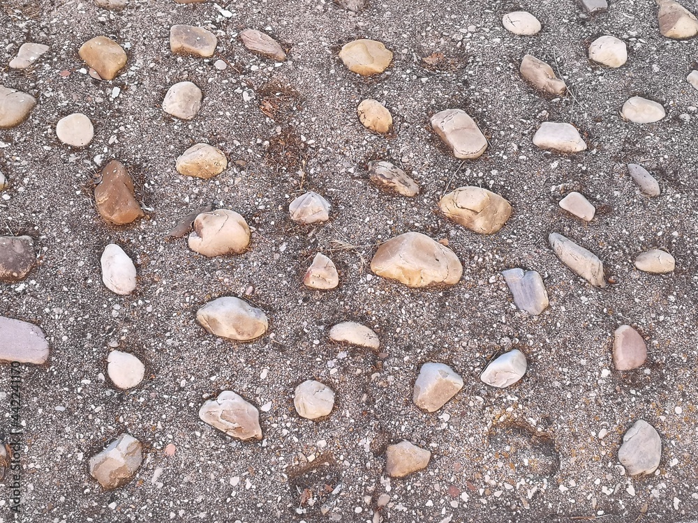 Cooblestone pebbles street in summer Cooblestone pebbles street in summer