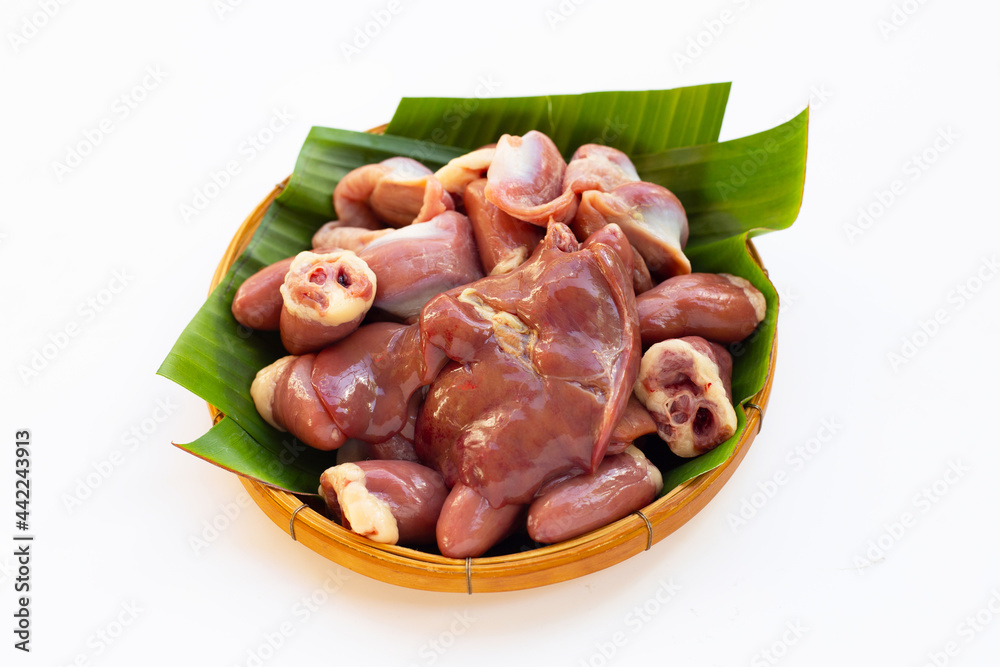 Mixed chicken entrails in bamboo basket on white background. Mixed chicken entrails in bamboo basket on white background.