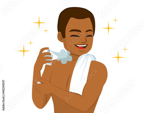 Portrait of happy attractive shirtless athletic black man applying perfume