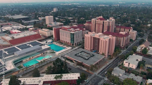 Aerial: San Jose State University and city skyline at sunset, San Jose, USA photo