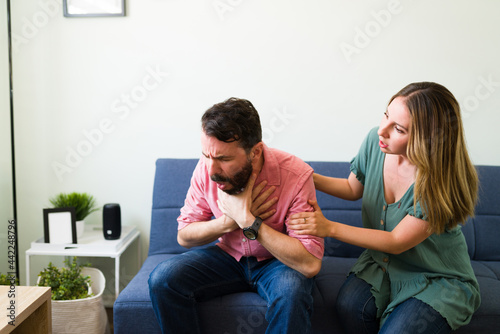 Man suffocating and with trouble breathing photo