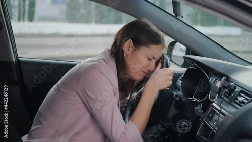 Wallpaper Mural depressed crying woman inside car, female driver is suffering inside automobile Torontodigital.ca