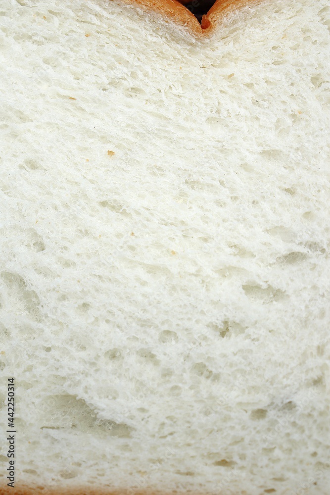 Close up of sliced loaf white bread breakfast food Close up of sliced loaf white bread breakfast food