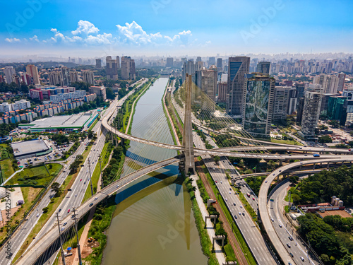 bridge over the river pinheiros in a blue sky day - ponte estaiada