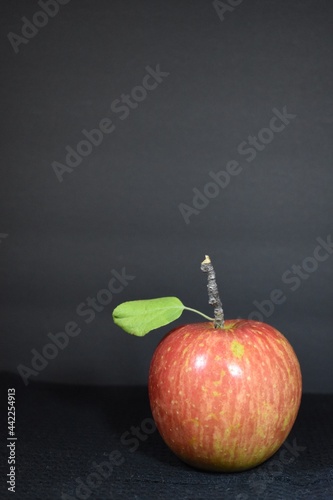 red apple with black background 