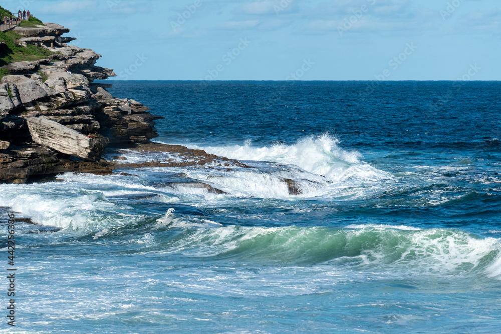 waves crashing on rocks after big storm