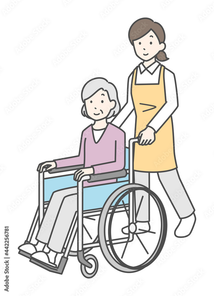 介護スタッフと車椅子のシニア女性