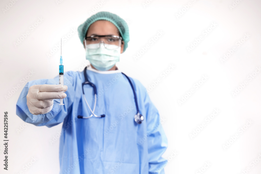 Doctor in surgical suite holding vaccine covid-19 syringe ,Coronavirus or Covid-19 outbreak concept