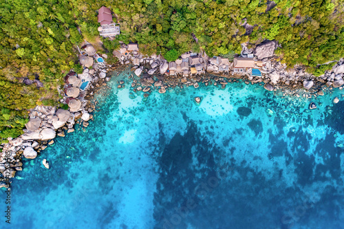 Clean Clear Blue Ocean Sea Water with rocks beach no people copy space paradise tropical island beautiful Koh Tao Thailand drone ariel aerial uav © Huw Penson