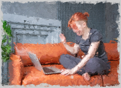 Tela Girl communicates online using a laptop sitting on sofa