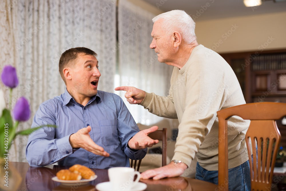 Misunderstanding and quarrel between senior father and son