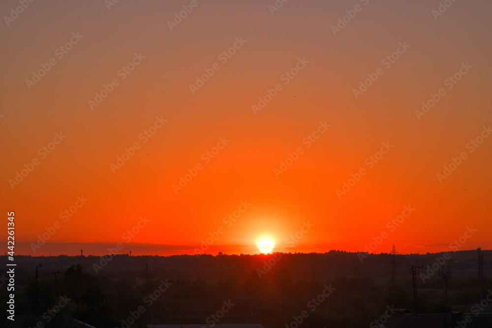 Fototapeta premium sunset over the field