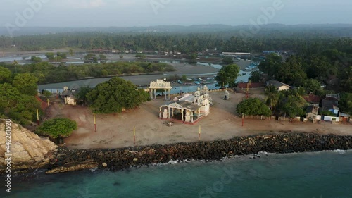 Colorful Hindu temple on tropical shore of Sri Lanka, Muthumariamman photo