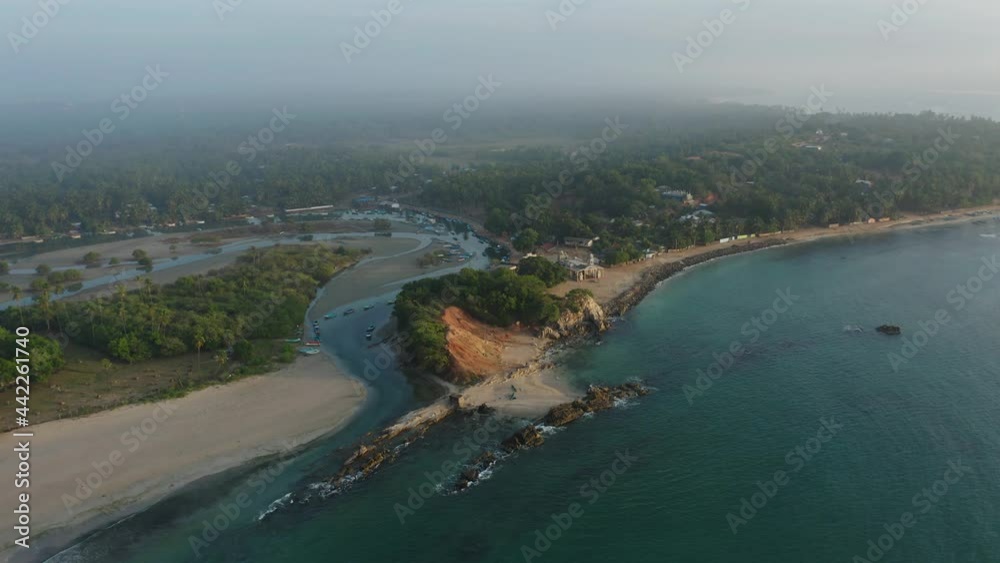 River inlet shore of Sri Lanka at Salli Beach tropical destination dawn River inlet shore of Sri Lanka at Salli Beach tropical destination dawn